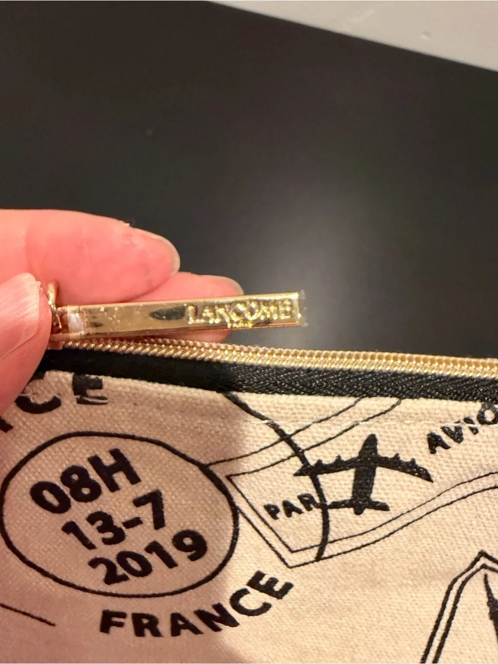 Lancome Beige Cosmetic Pouch with Black Travel Stamp Print